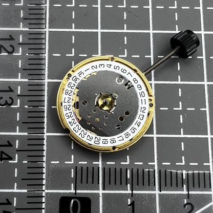 ETA F03.115 quartz watch movement with 3 hands and date at 3 o'clock, precision timing component.