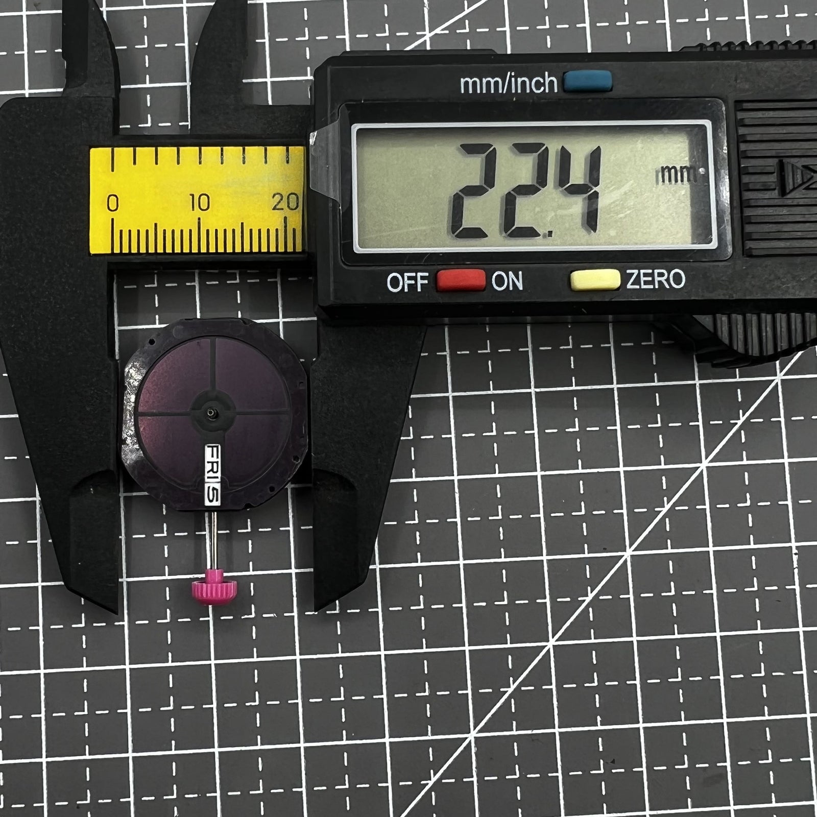Citizen E101M Eco-Drive watch with Japan movement, date window at 3 o'clock, sleek black dial.