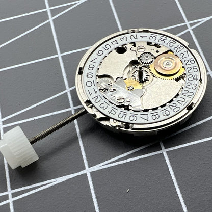 ETA556.115 Swiss Made quartz watch movement with 3 hands and date display at 3 o?clock for precision timekeeping.