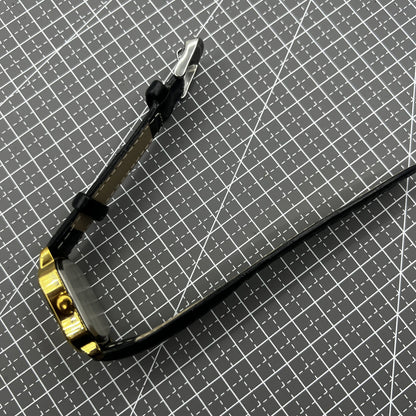 28mm Tianjin Seagull octagonal gold watch with golden dial, manual mechanical movement, elegant design accessory.