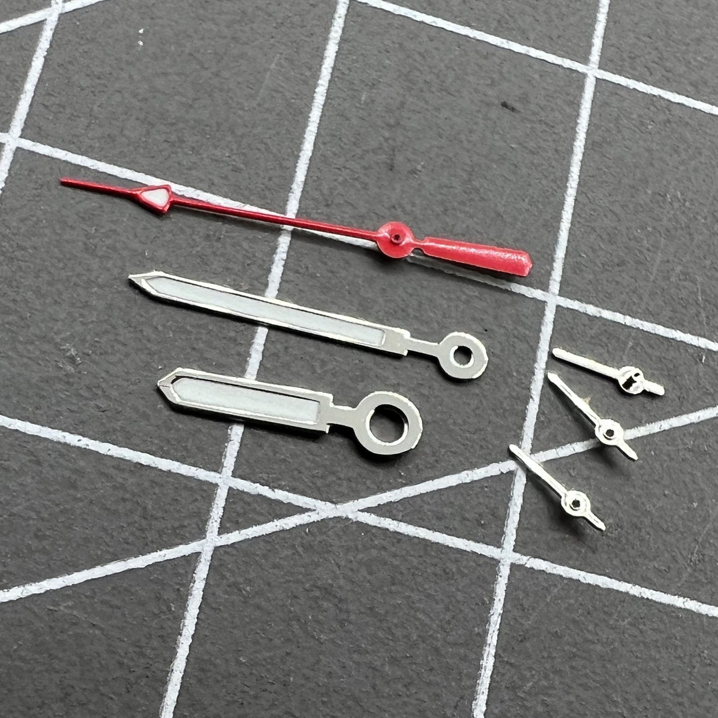 Set of 12mm silver-trimmed watch hands with red second hand and green luminous for Miyota 0S10