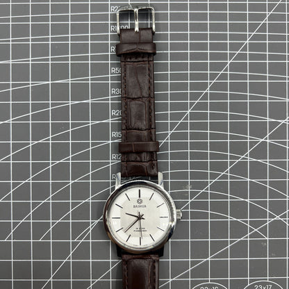 China Baihua 37mm manual mechanical watch with silver dial, 19 jewels, and shock-resistant design.
