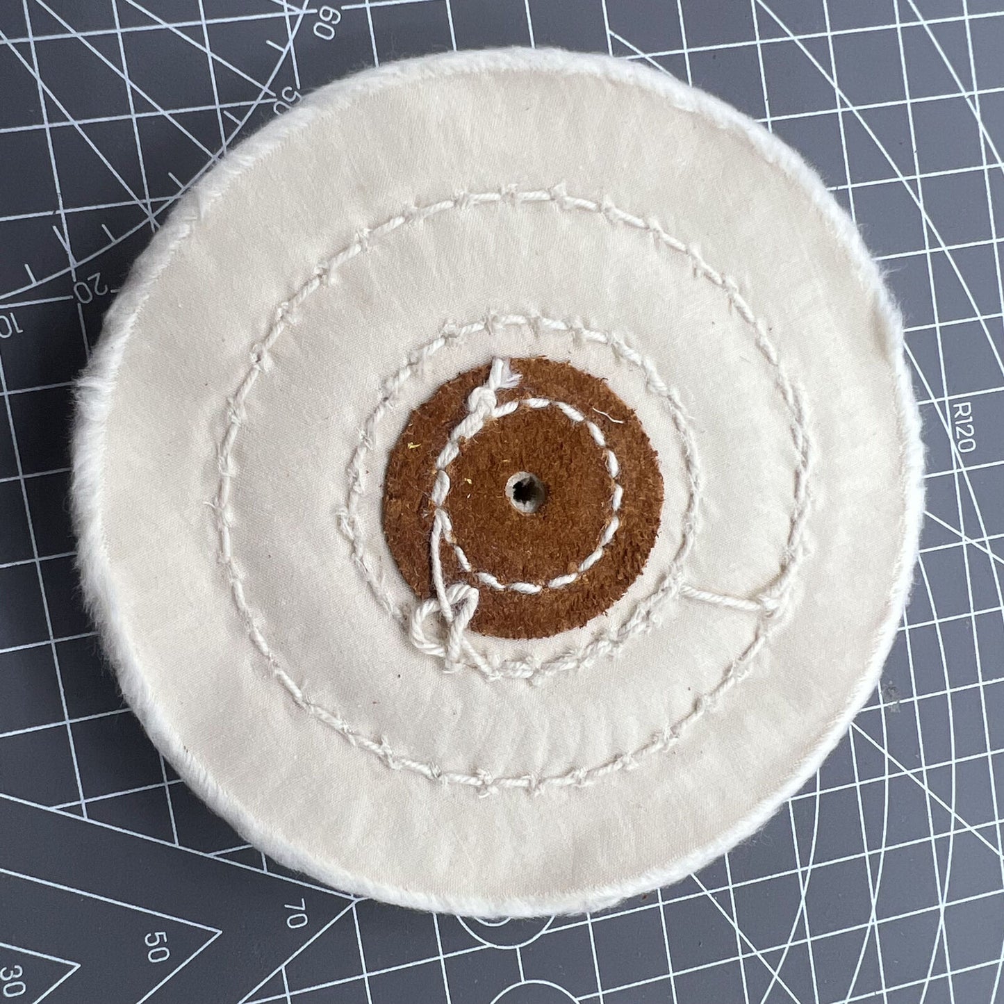 Bergeon 5175-100 white polishing buff wheel for Swiss Made watch accessory cleaning and finishing.