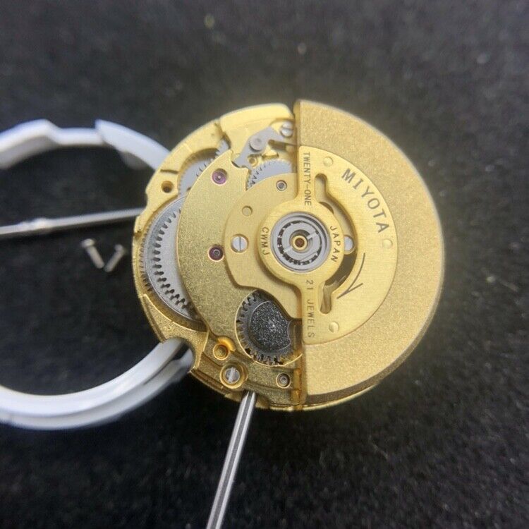 Miyota 6T51 golden plated automatic watch movement showcasing precise mechanical timekeeping by Citizen.