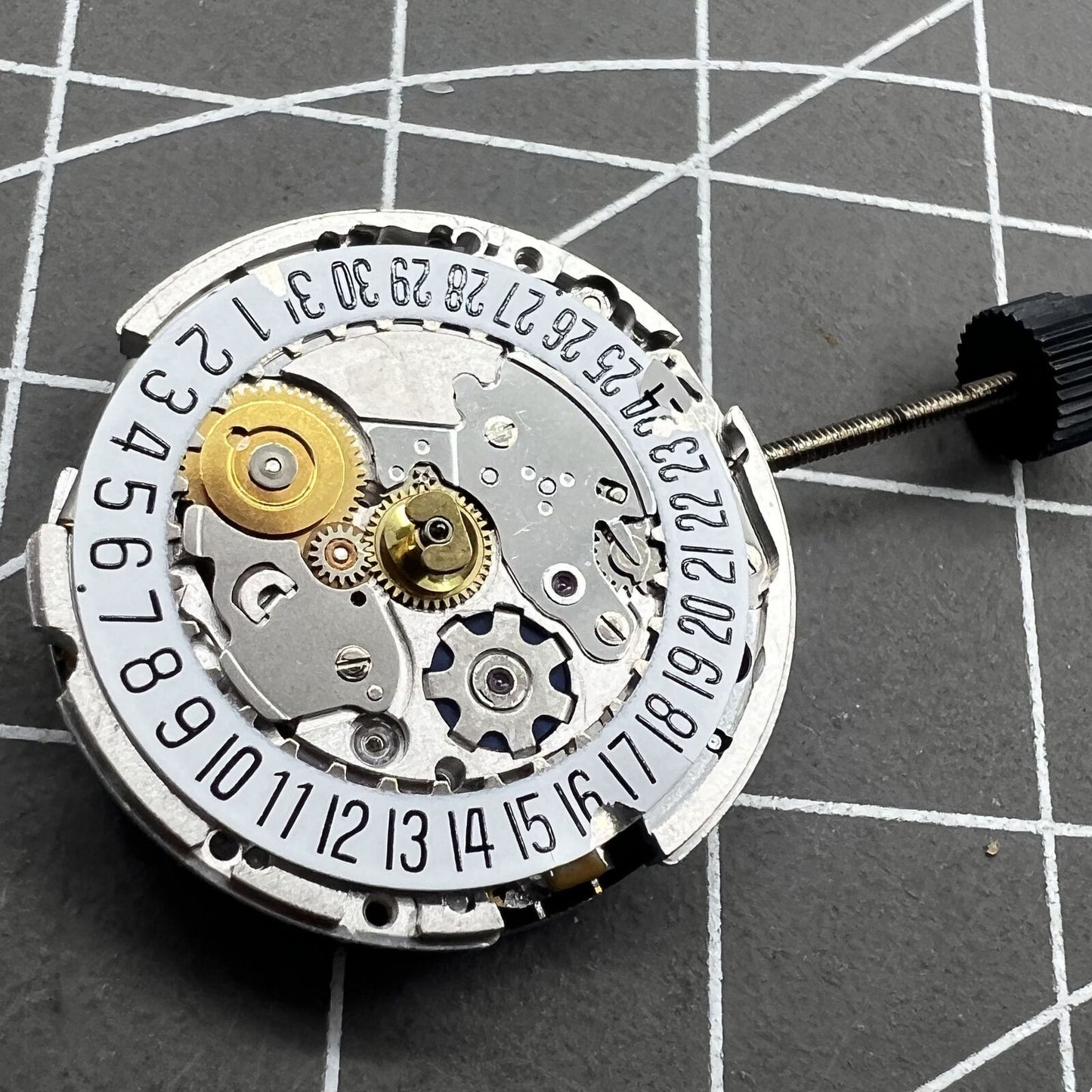 Swiss ETA 204.911 mechanical watch movement by ETA, featuring automatic winding for precise timekeeping.