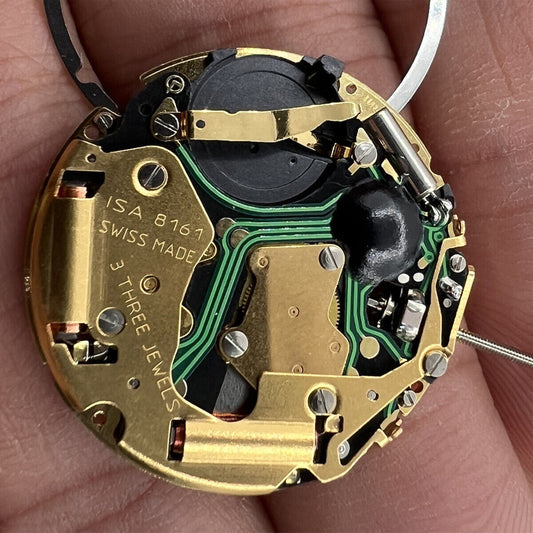 ISA 8161 golden watch part with Swiss quartz movement, 3 hands, ideal for watch accessories.