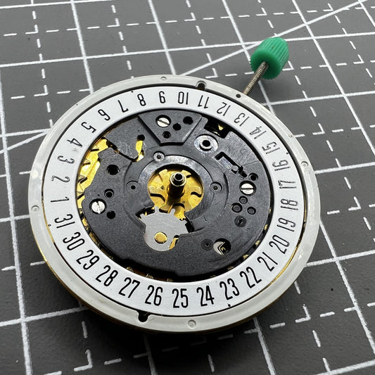 ISA 8172 quartz watch movement by ISA, precise timekeeping replacement for maintenance and repair.