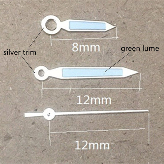 Aiguilles de montre luminescentes vertes en forme de flèche avec garniture argentée de 12 mm pour mouvement Miyota 1M12