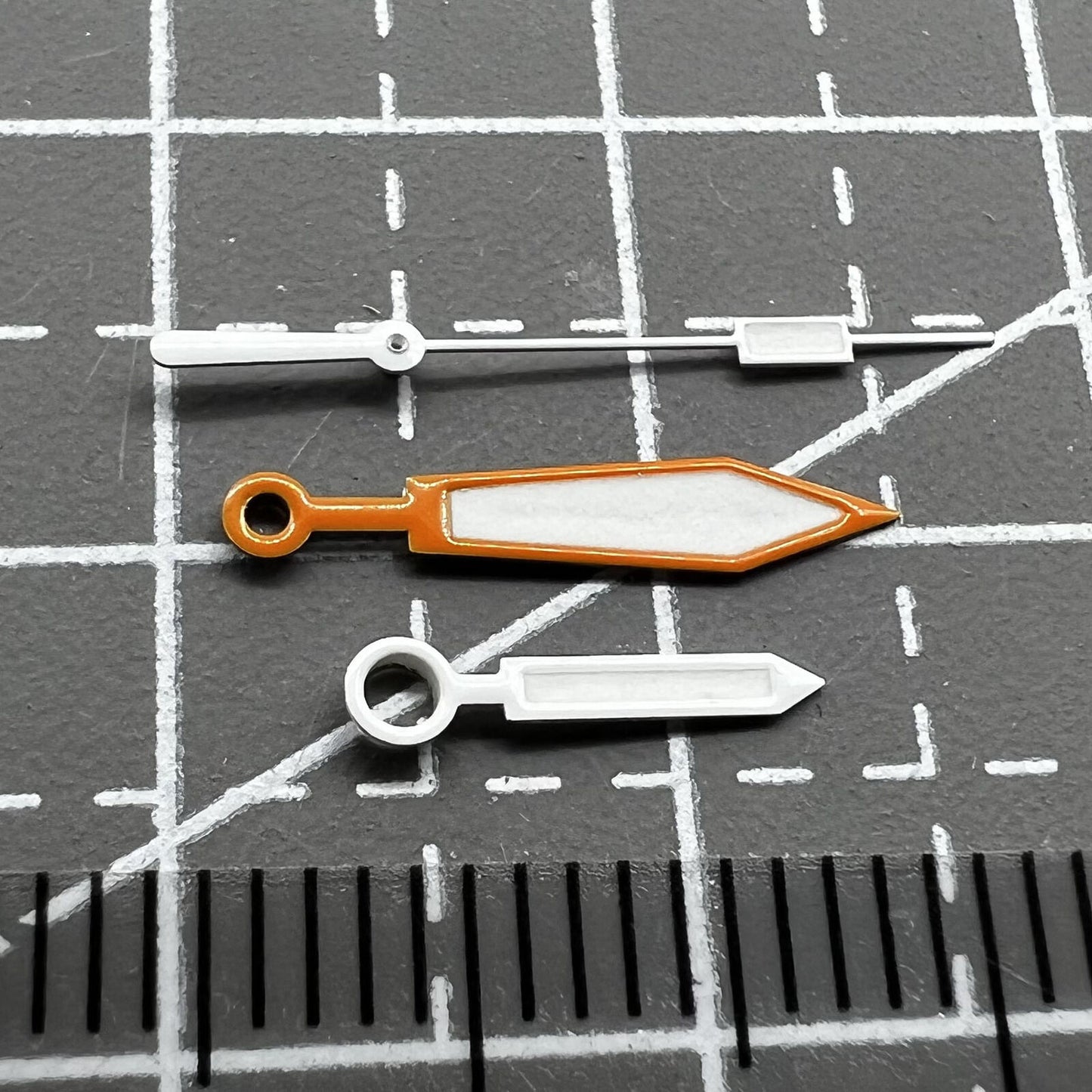 Orange and silver trimmed green lume watch hands for ETA 2836/2846/2824/2846 movements, precision fit.