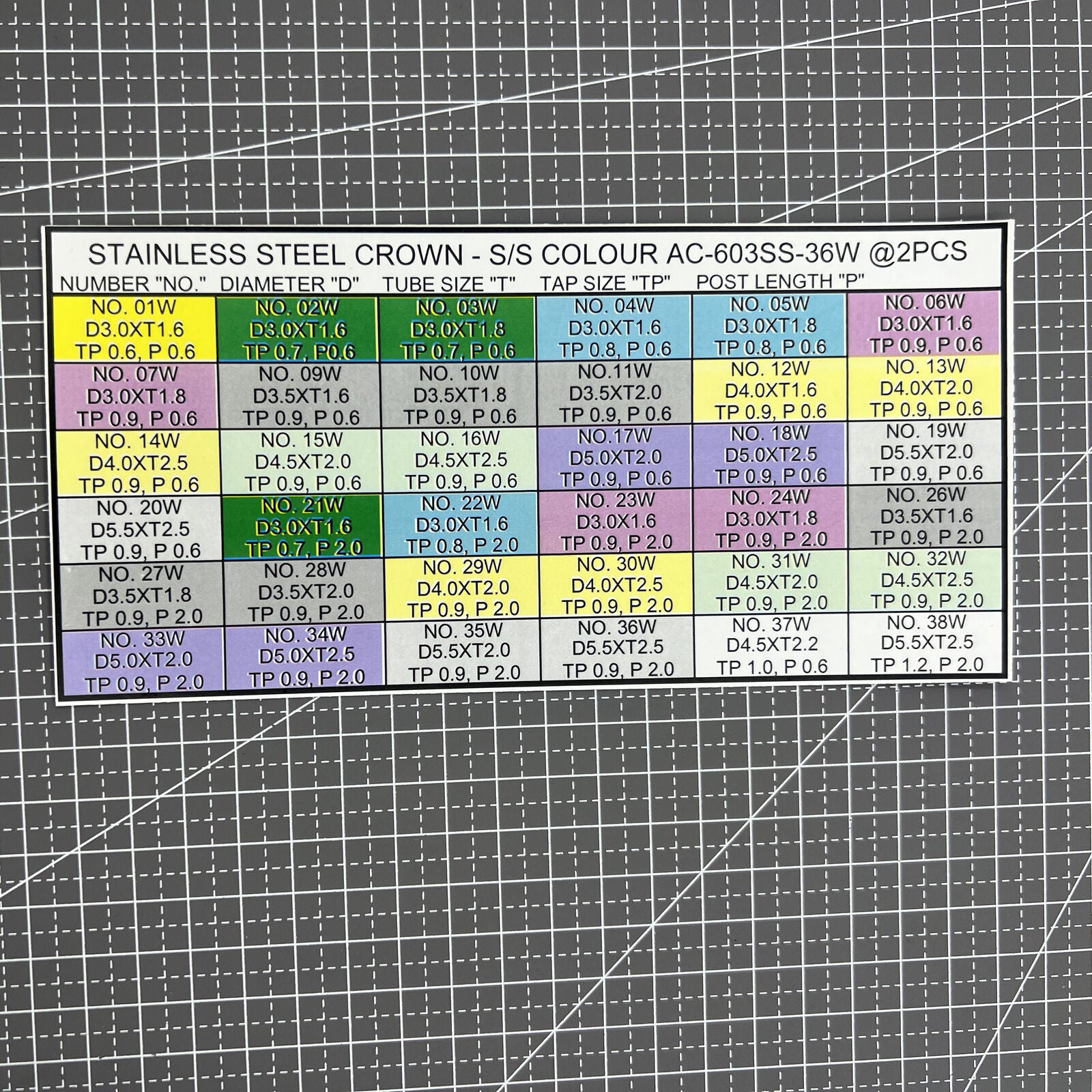 Assorted stainless steel watch crowns in 36 silver sizes for precision watch repairs.