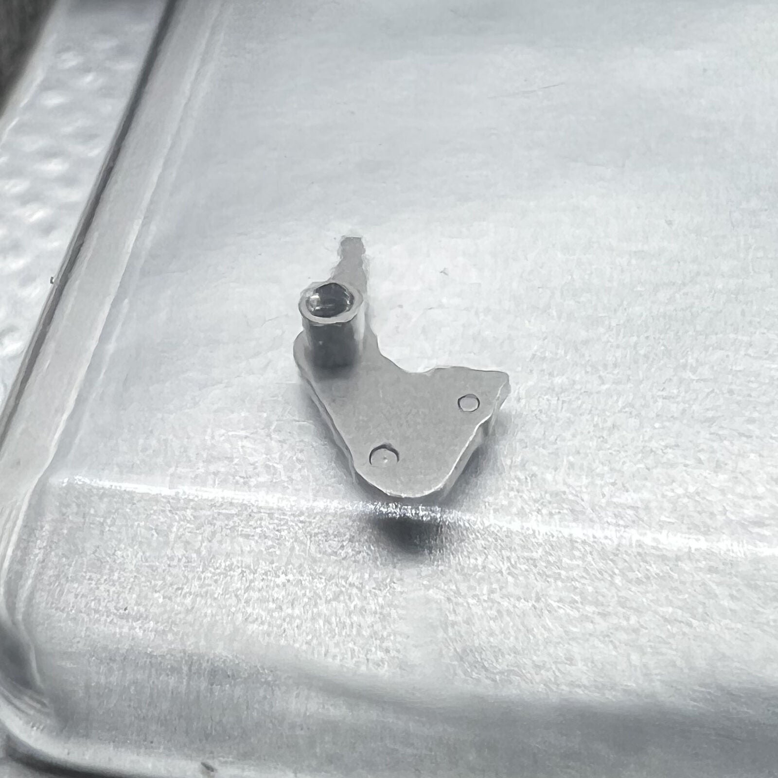 Precision setting lever for Omega 3303 3313 Swiss watch movement, essential for accurate timepiece repair and maintenance.