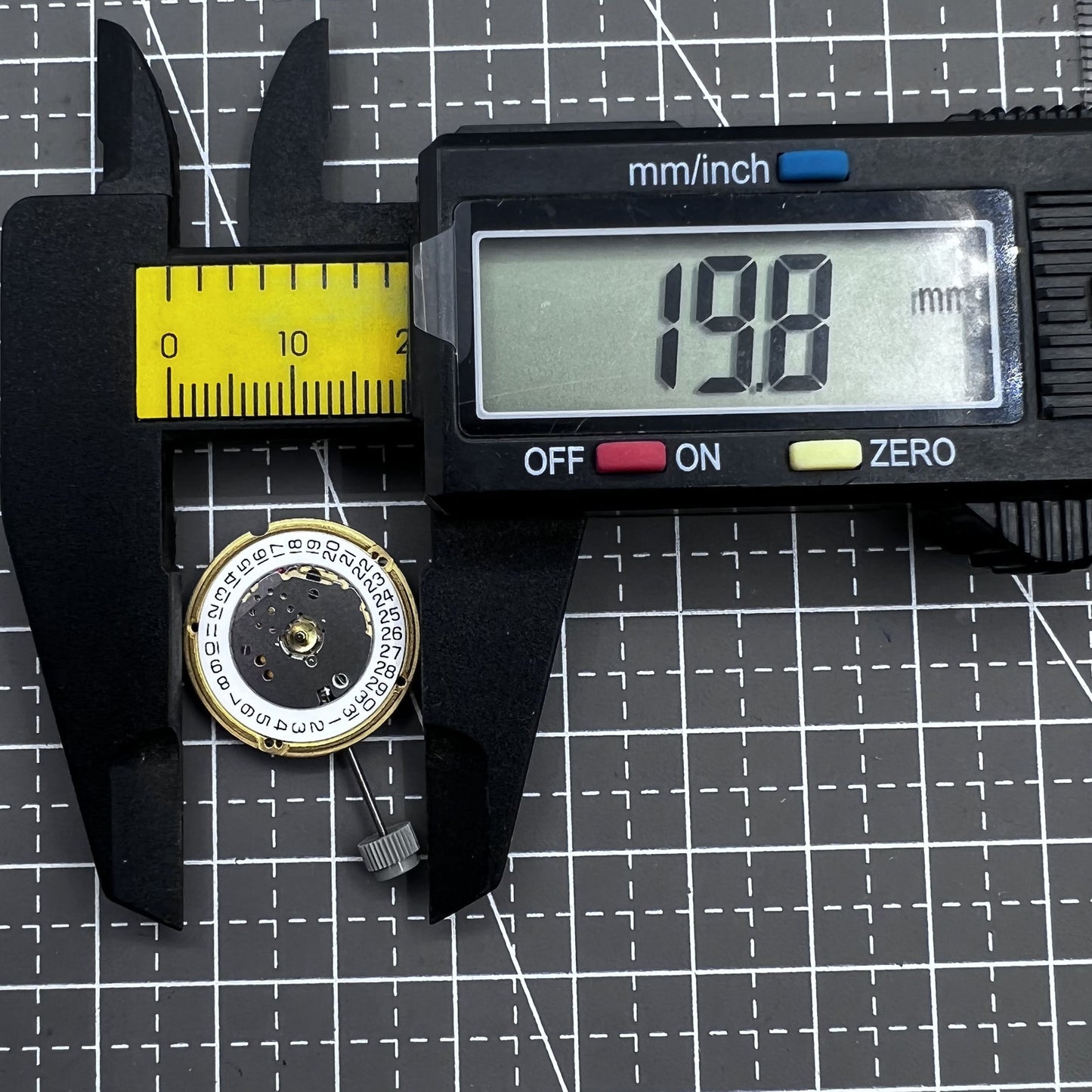 Swiss ETA F04.115 quartz watch movement with 3 hands and date display at 3 o'clock for precision timing.