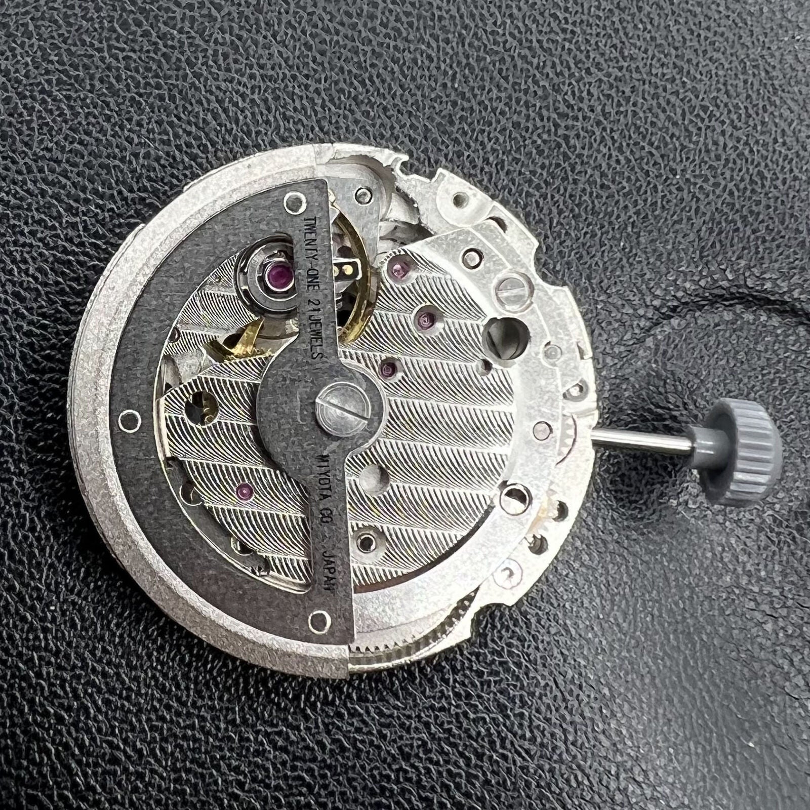 Miyota 8217 automatic watch movement with small second at 9, precision Japan-made mechanism by Citizen.