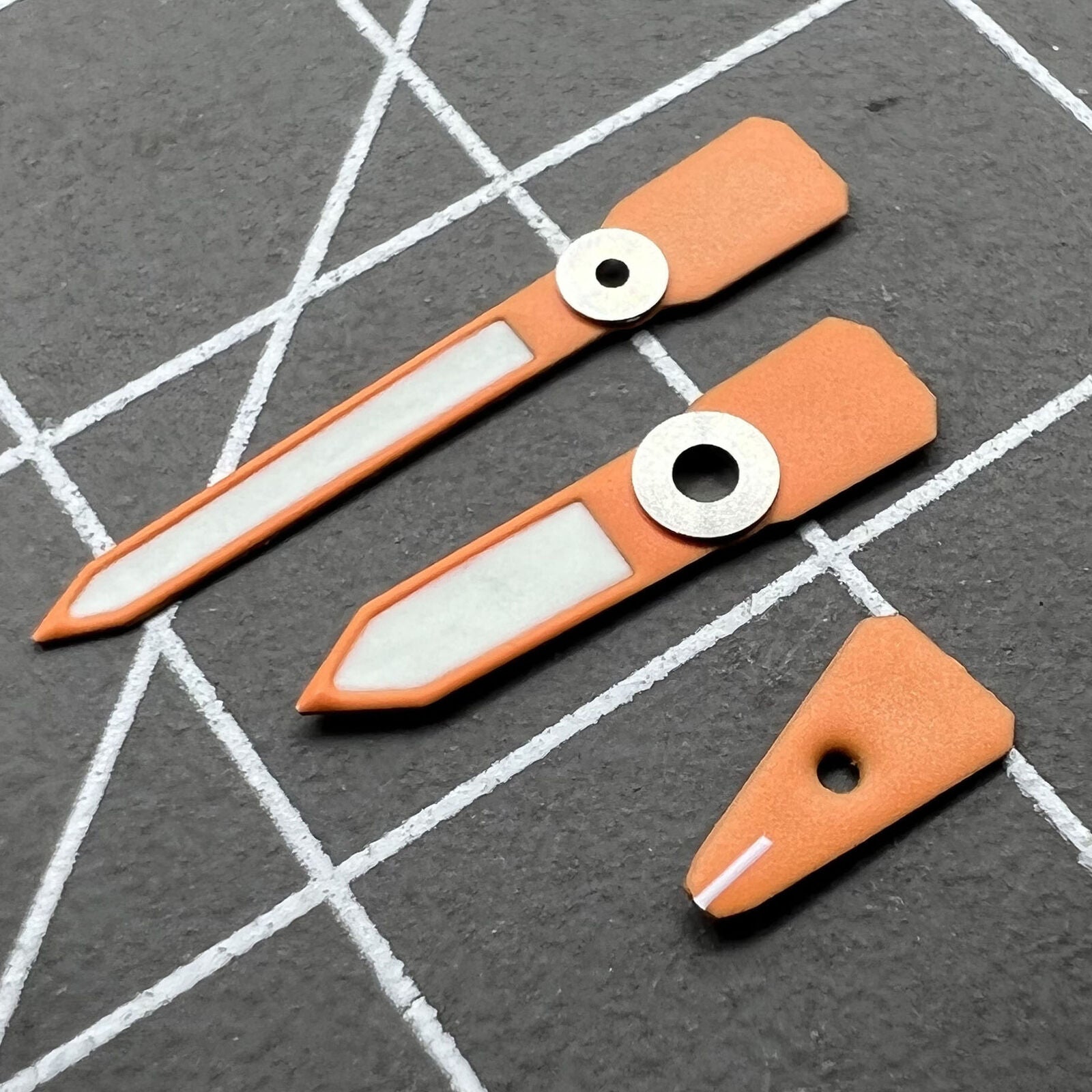 Orange luminous enamel watch hands for Casioak GA2100 GAB2110, vibrant C3 glow, precision craftsmanship.