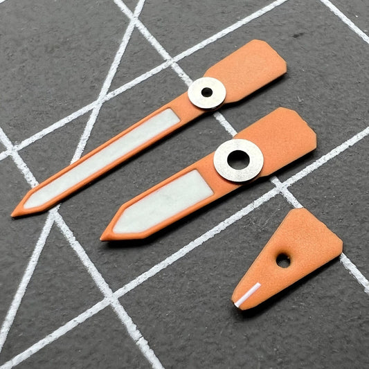 Orange luminous enamel watch hands for Casioak GA2100 GAB2110, vibrant C3 glow, precision craftsmanship.