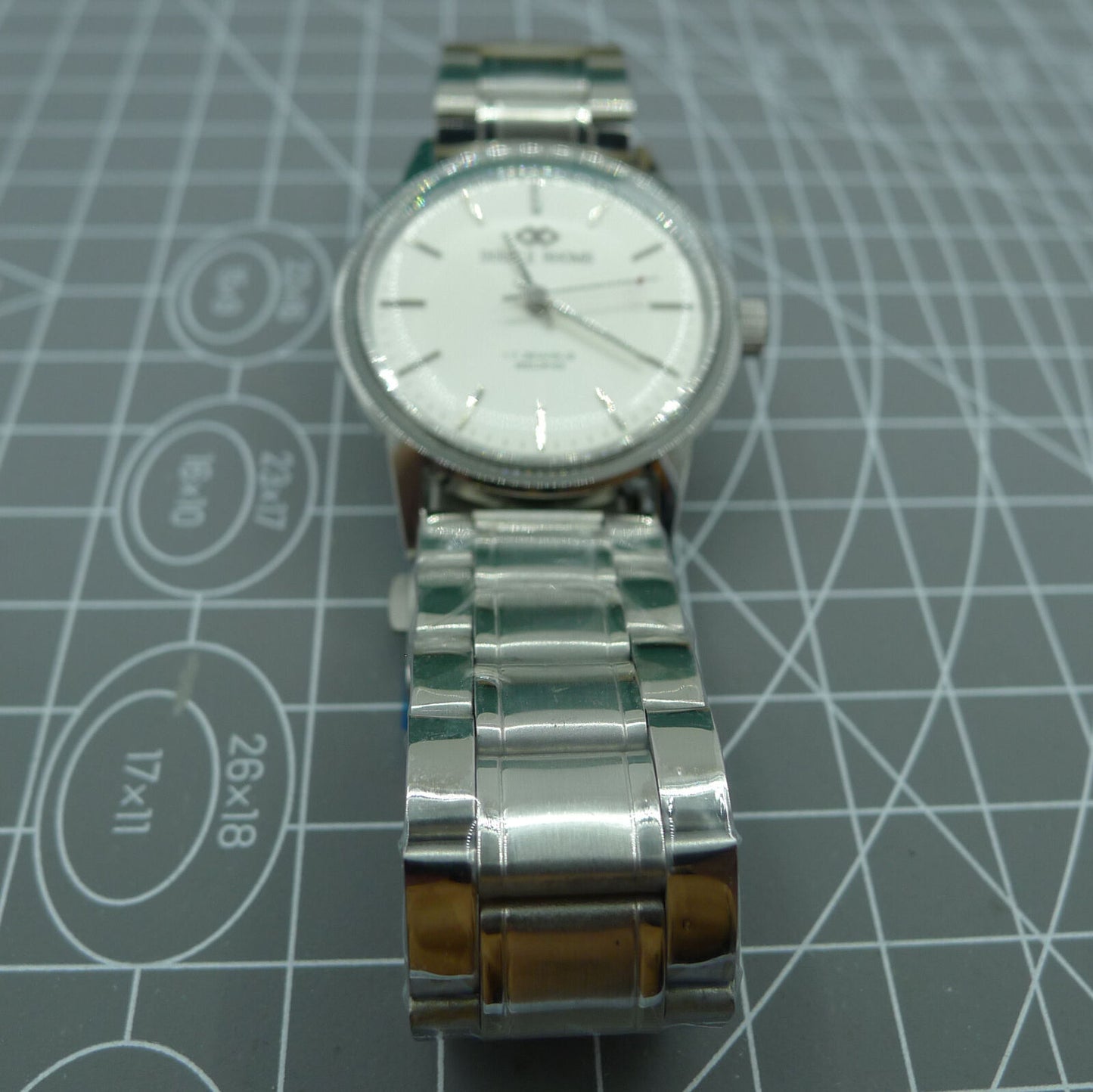 Beijing 36mm manual watch with silver case, nail-shaped markers, classic style for elegant wristwear.