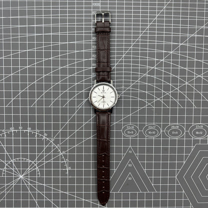 China Baihua 37mm manual mechanical watch with silver dial, 19 jewels, and shock-resistant design.