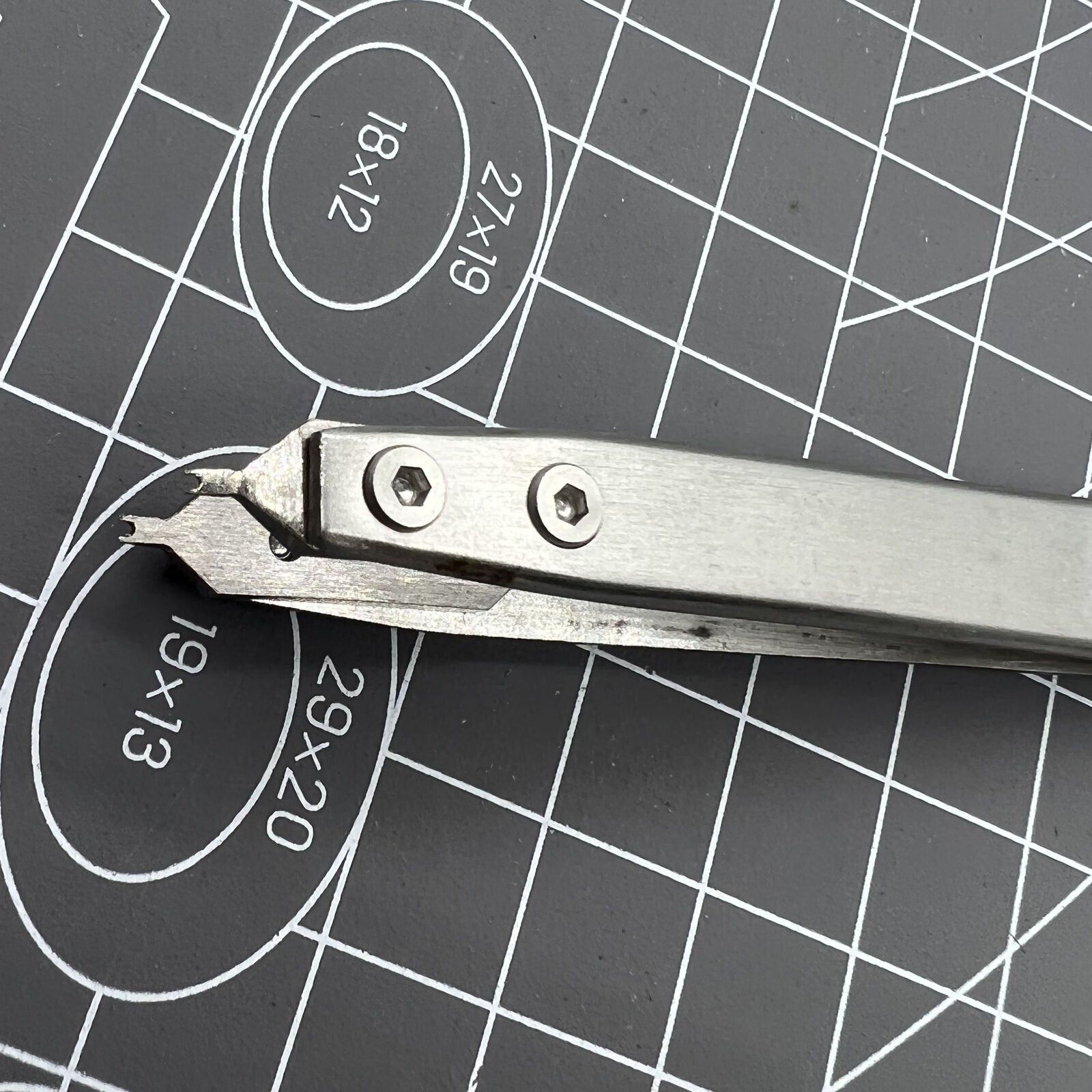 Bergeon 7825 spring bar tweezer tool for precise watch lug spring bar removal and fitting.