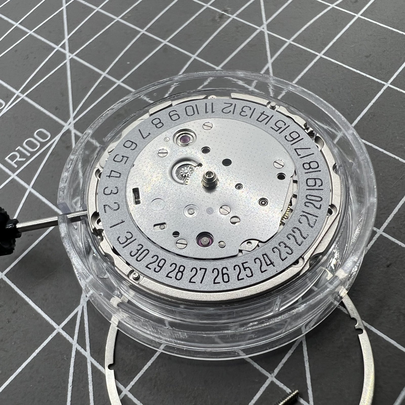 Miyota 9019 automatic watch movement with mechanical date display at 6 o'clock, precision Japanese brand.