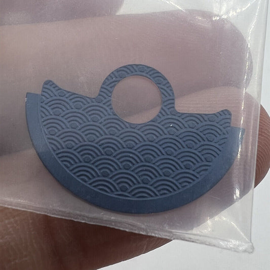 Waved blue metal sheet overlay for Miyota 9015 rotor, enhancing watch movement aesthetics.