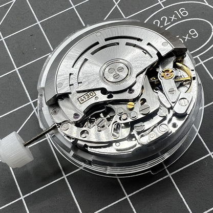 Chinese 4130 automatic watch movement showcasing small second subdials at 3, 6, and 9 o'clock positions for precise timekeeping.
