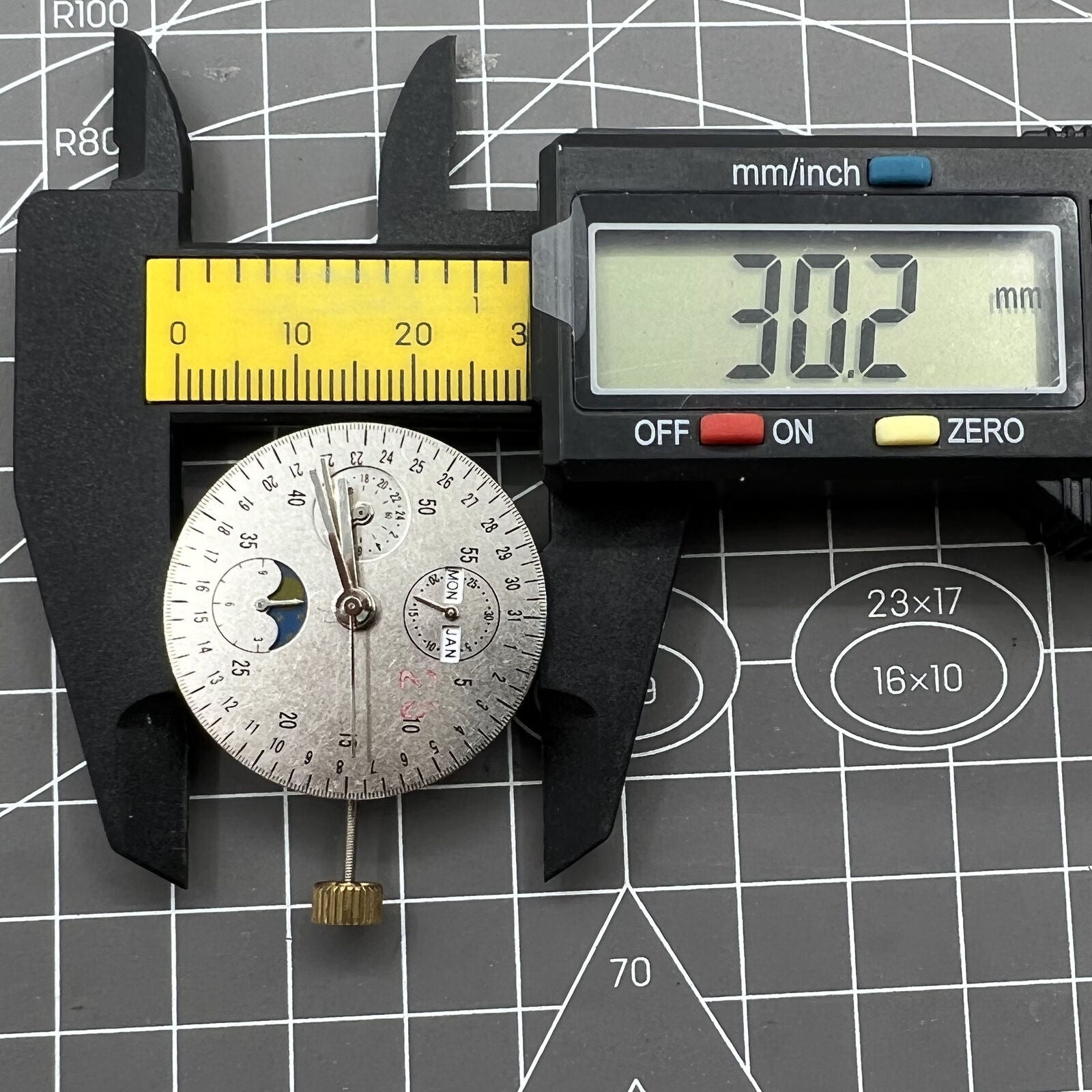 Dandong 7751 automatic watch movement displaying 8 hands for multifunctional time tracking by Dandong.