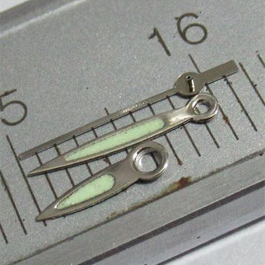 Arrow-shaped silver trim watch hands with green lume for Miyota 2035, 2115, 2105 movements.