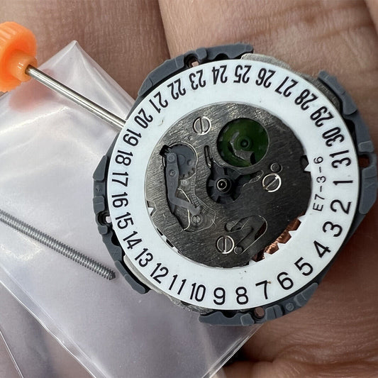 Miyota 1N12 Japan quartz watch movement with date display at 3/6, precise replacement part.