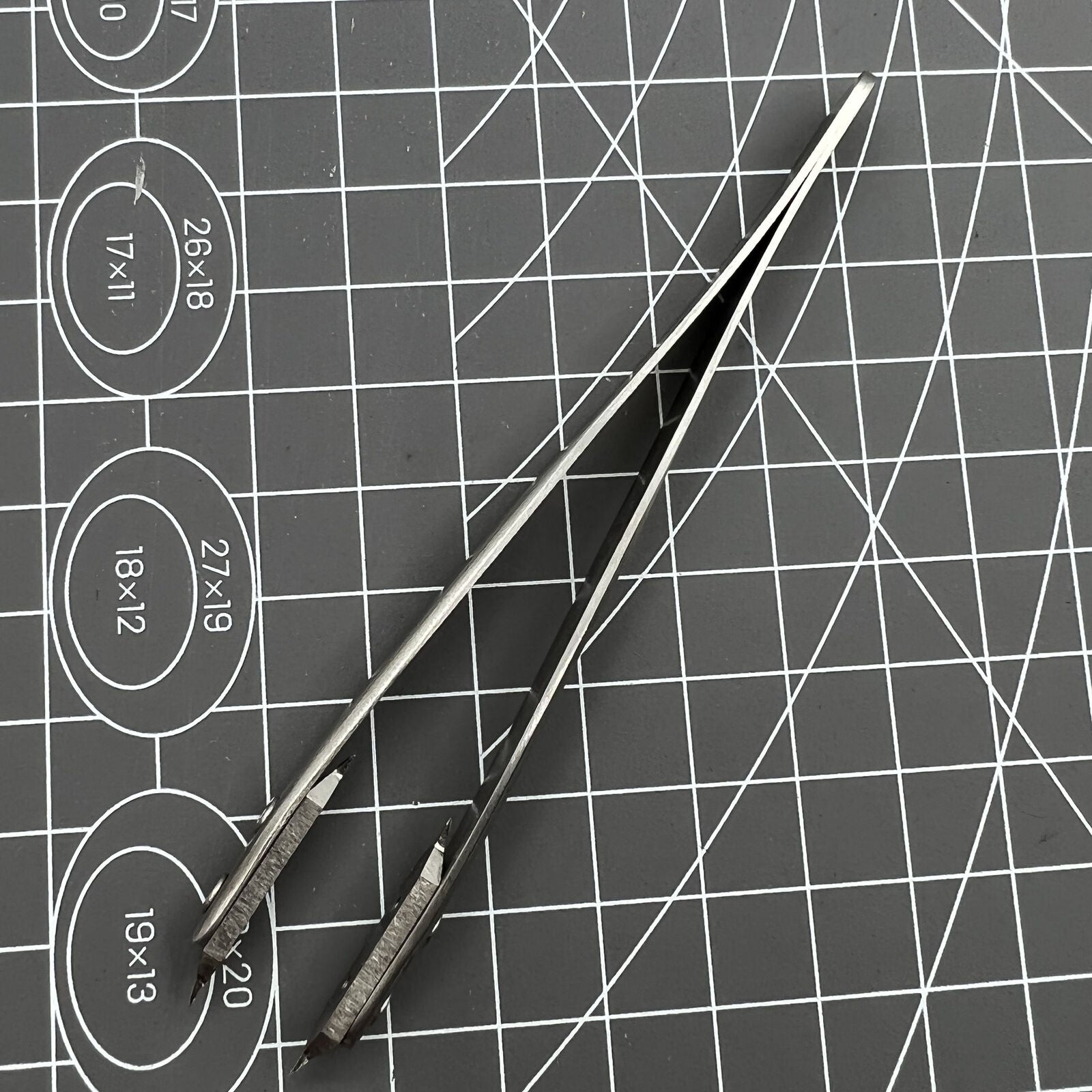 Spring bar tweezer tool by Bergeon 7825 for precise watch lug spring bar removal and fitting.