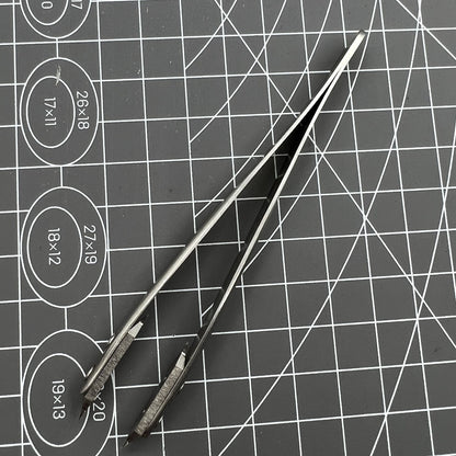 Spring bar tweezer tool by Bergeon 7825 for precise watch lug spring bar removal and fitting.