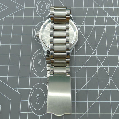 Shanghai Factory 36.5mm manual mechanical watch with 19 jewels, shock-resistant for lasting precision and style.