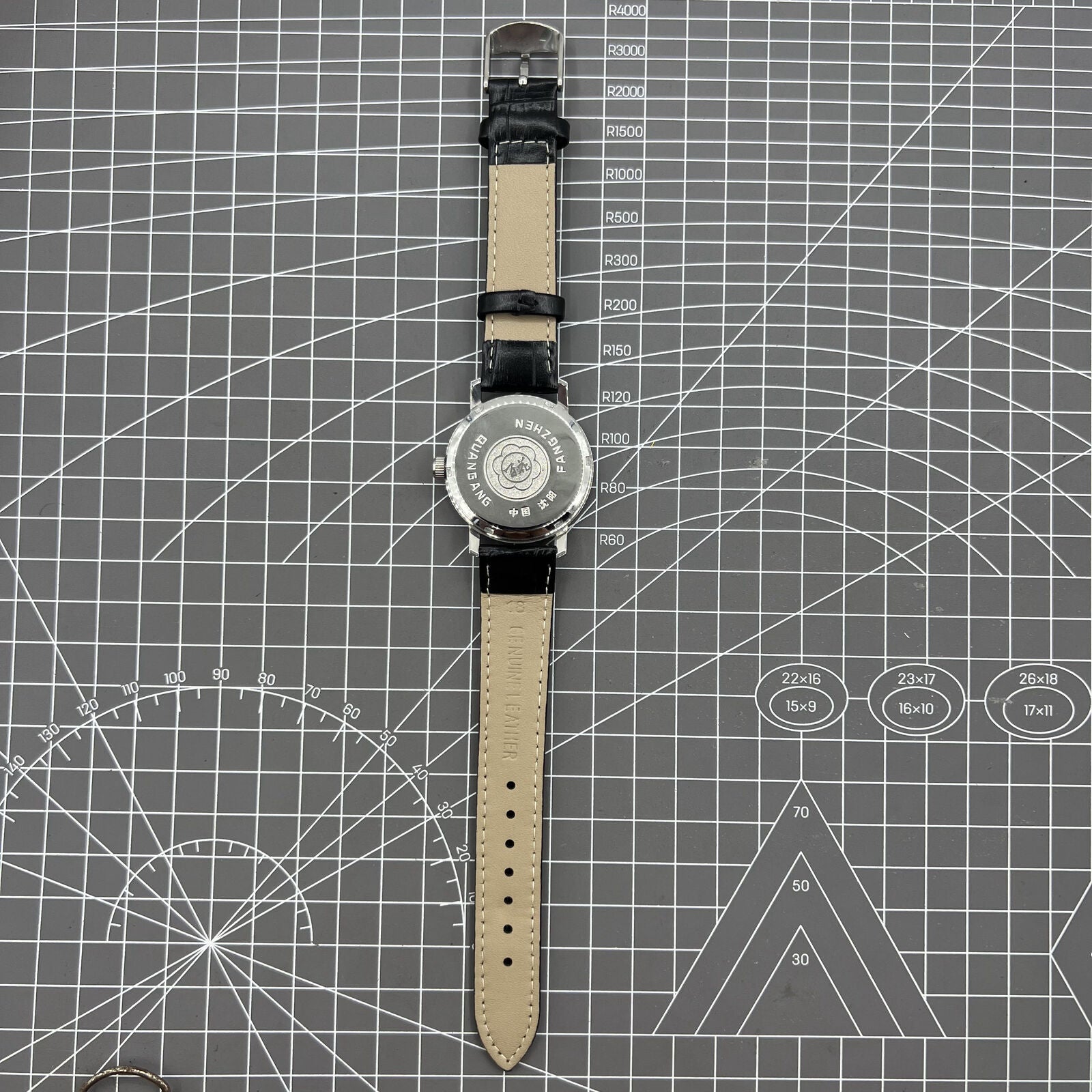 China Baihua 37mm manual silver dial watch with 19 jewels and shock-resistant durable design.