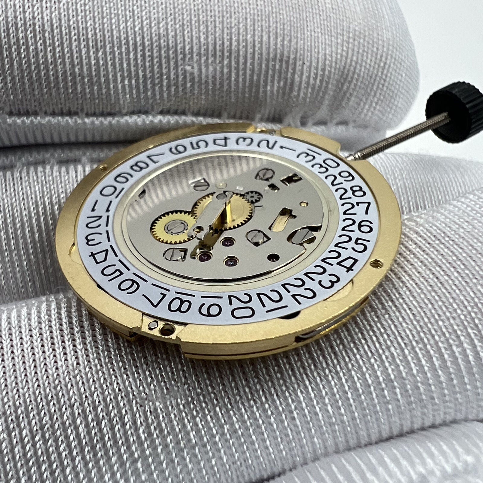 Swiss Movement Ronda 1006 Slimtech quartz watch mechanism for precise timekeeping and durability.