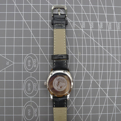 Beijing 31mm manual mechanical watch with silver case and double rhomb dial, showcasing classic Chinese craftsmanship and elegant design.