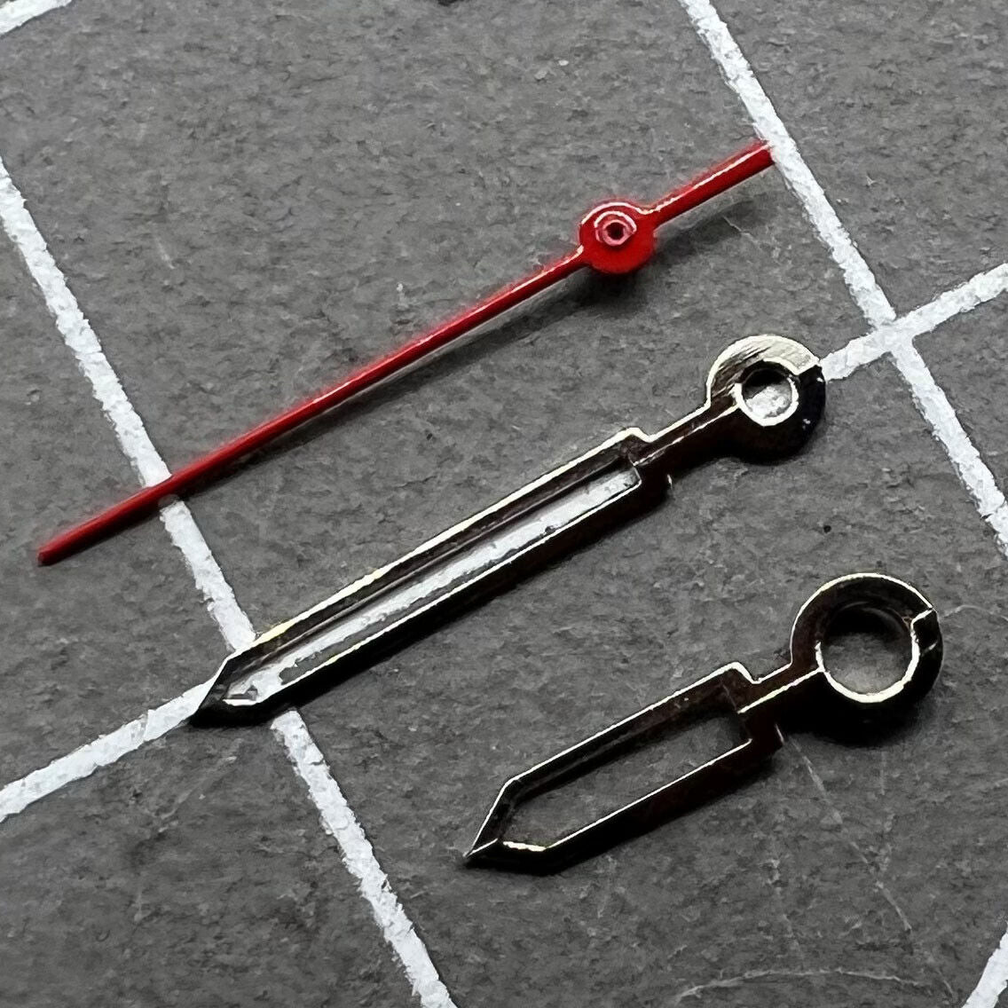 Red watch hands set for Miyota 2035 movement, precision fit in 16mm, 13mm, 9mm sizes.