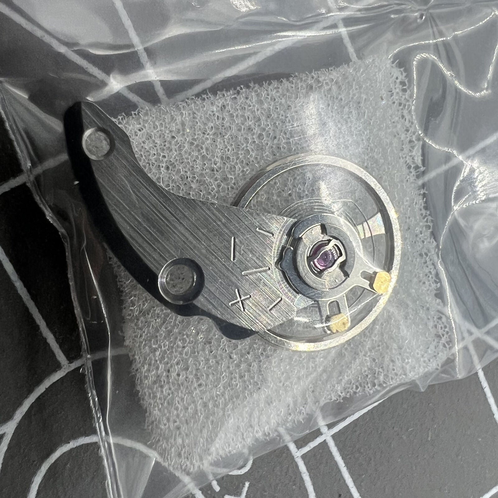 Silver watch balance wheel with splint, compatible with Miyota NH35 NH36 movements, precision replacement.