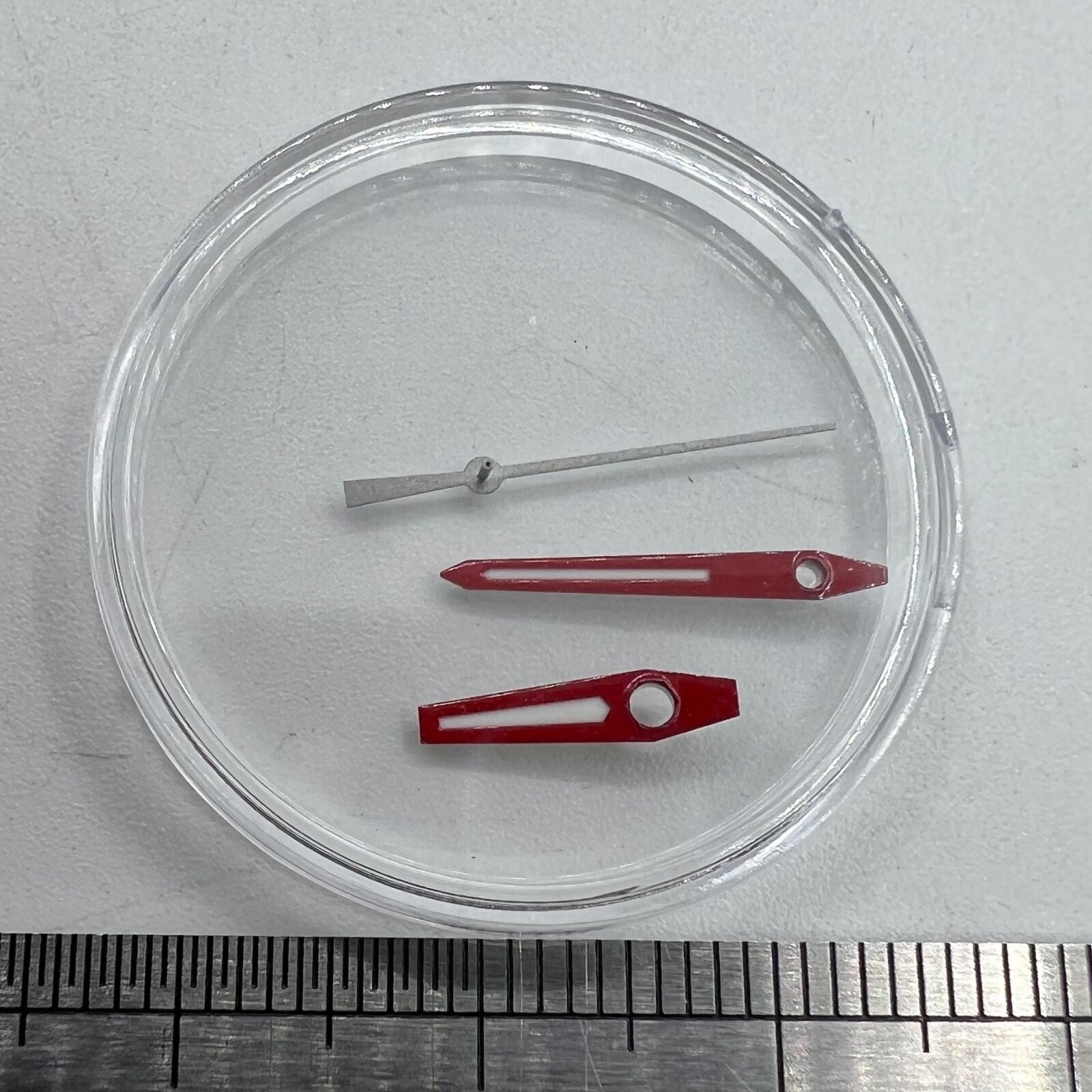 Red-trimmed watch hands with green luminous fill, compatible with Miyota 8215, 8205, DG2813 movements for precise timekeeping.