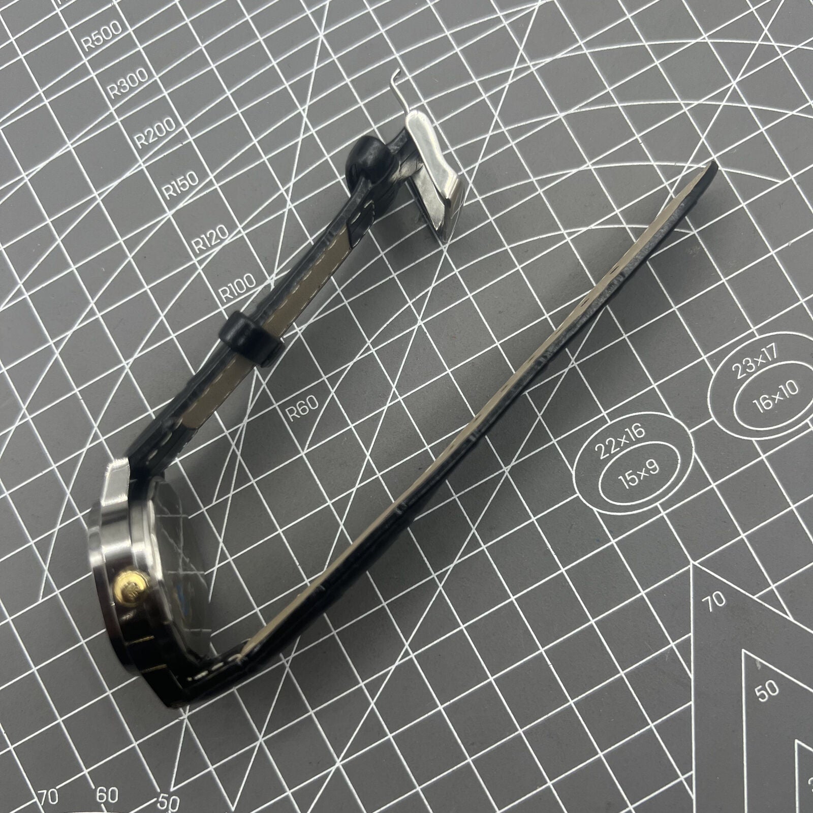 Shanghai Factory 34mm manual mechanical watch with black dial, 19 jewels, shock-resistant for daily wear.