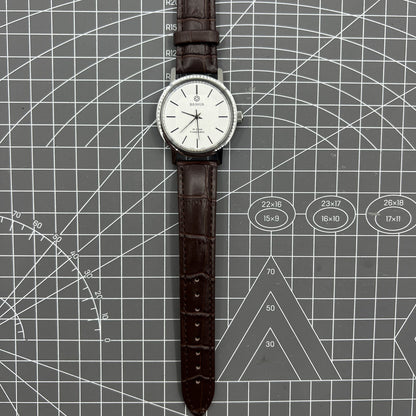China Baihua 37mm manual mechanical watch with silver dial, 19 jewels, shock-resistant for daily wear.
