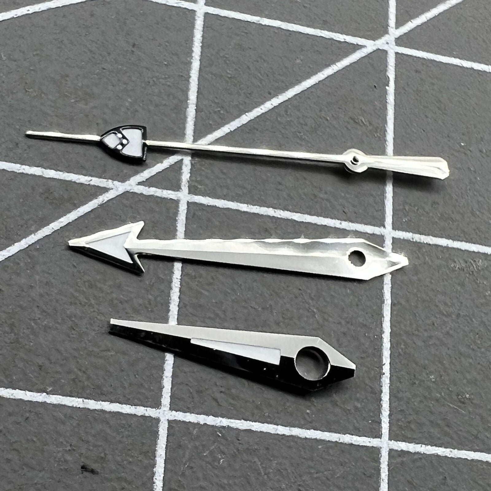 Silver pointed second hand with green lume, designed for NH35/36 watch movements.