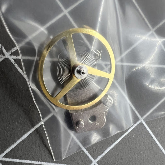 Balance wheel with splint for Dandong 7750 watch movement, 28800 frequency precision component.