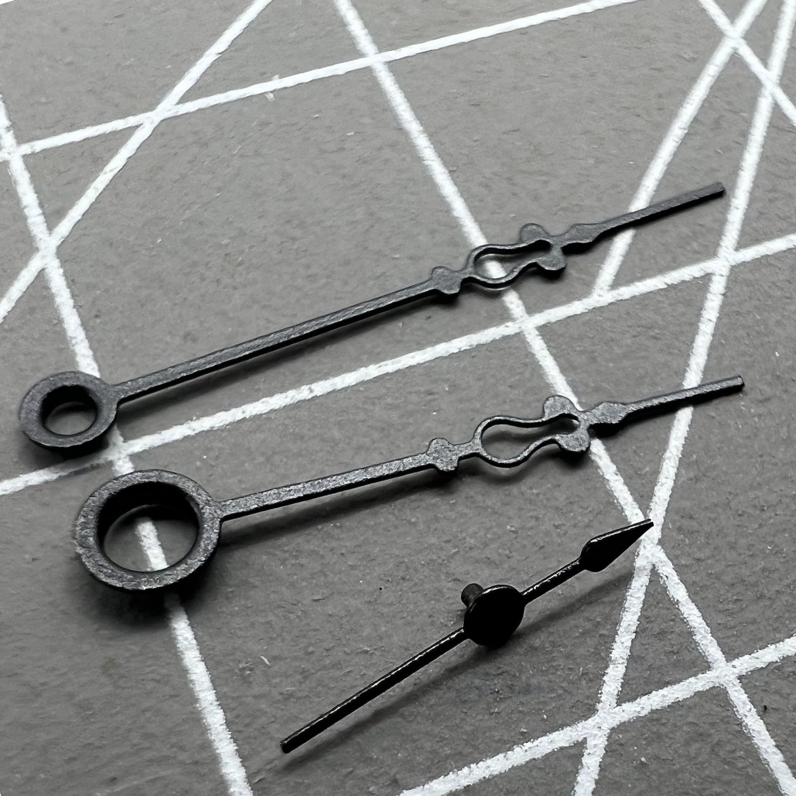 Small black floral watch hands by Seagull, designed for ST3600/ST3621 and ETA6497/6498 movements, elegant accessory.