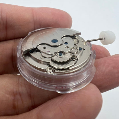 Shanghai LB20 automatic watch showcasing moon phase at 6 o'clock and big date at 12, highlighting Chinese craftsmanship.