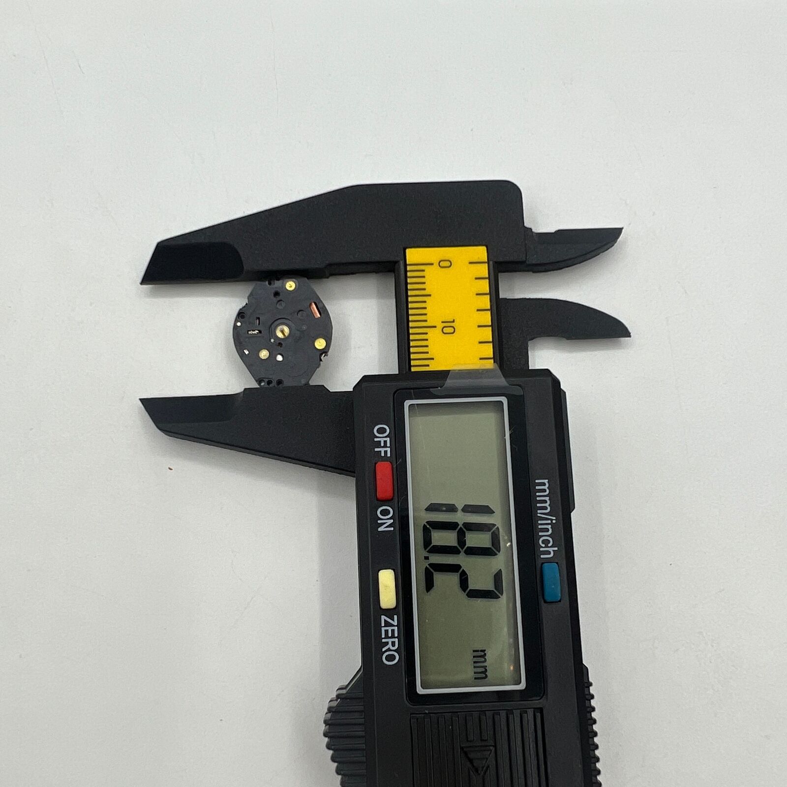 Hattori Epson TMI VX50E quartz watch movement, precision Japan-made mechanism for quality timepieces.