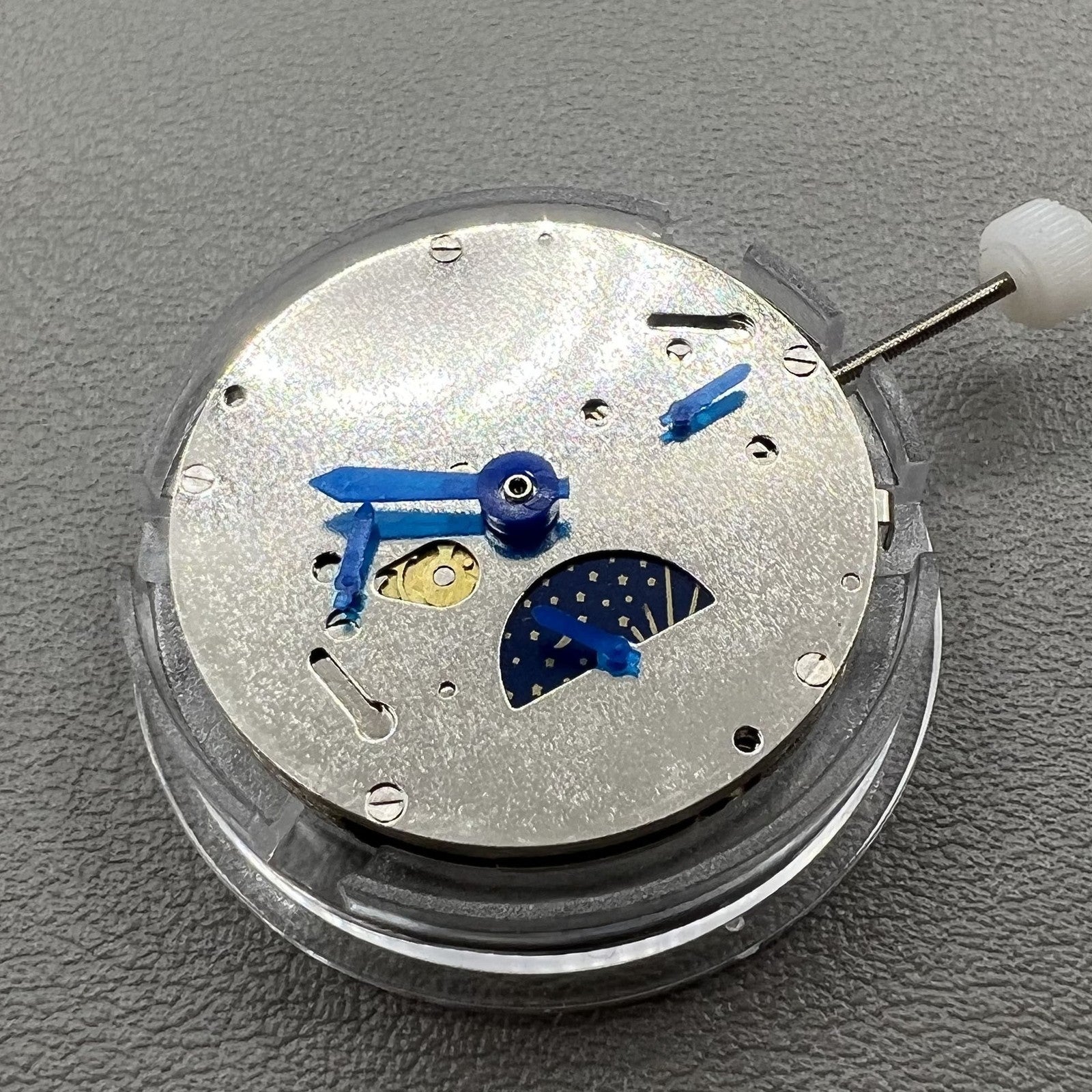 China Made 8205 automatic mechanical watch movement featuring small seconds at 3, 6, and 9 o'clock positions for precise timekeeping.