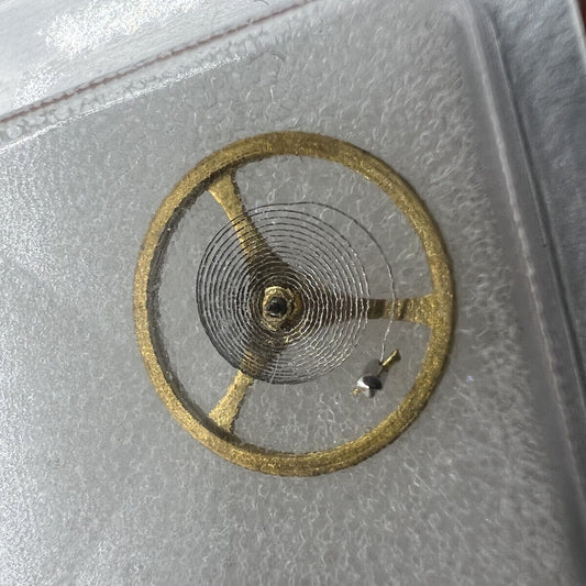 Silver and gold skeleton watch part with 2189 balance wheel, China-made replacement for accessories.