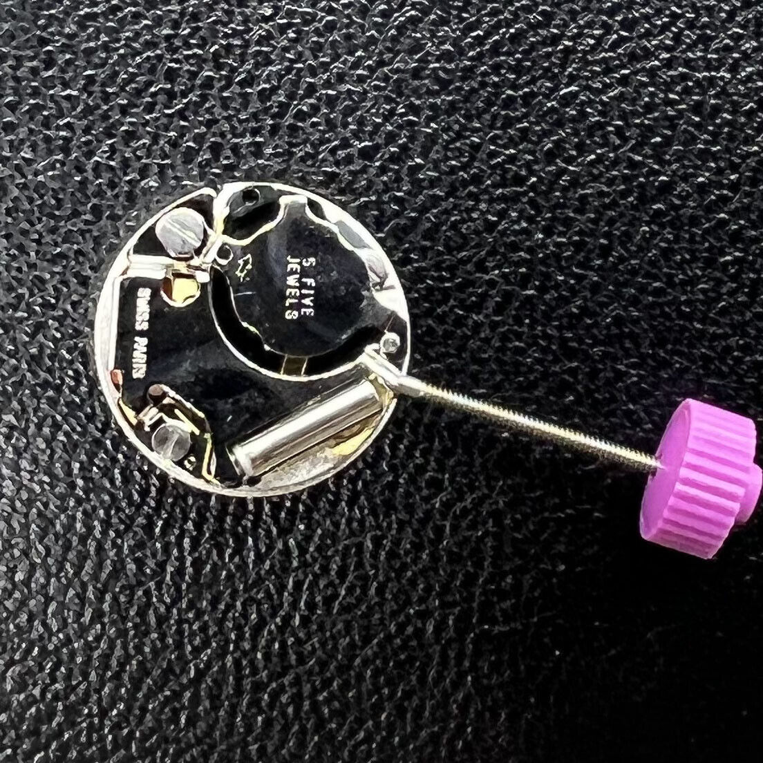 Ronda 1042 quartz watch movement with two hands, precise timekeeping for watch repair parts.