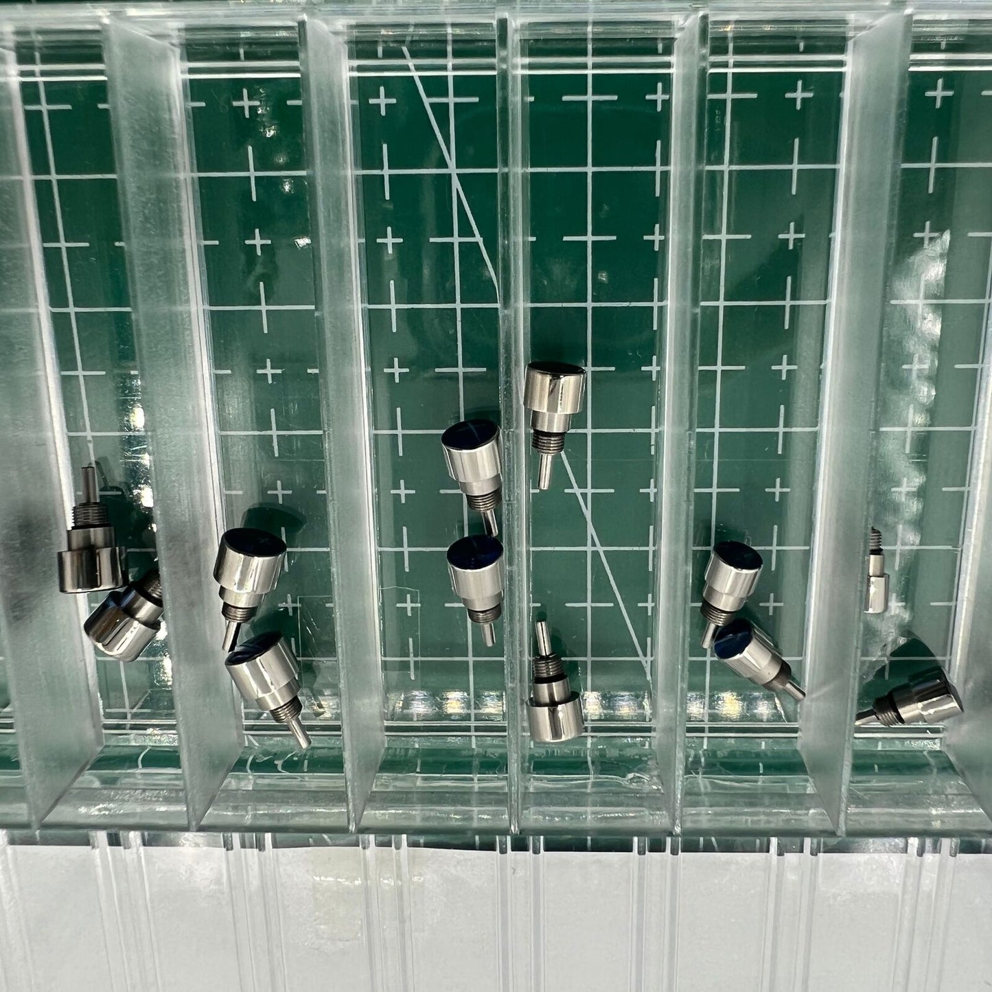 Silver stainless steel watch with classical pusher drive, elegant design for refined timekeeping.