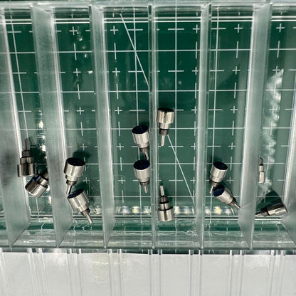 Silver stainless steel watch with classical pusher drive, elegant design for refined timekeeping.