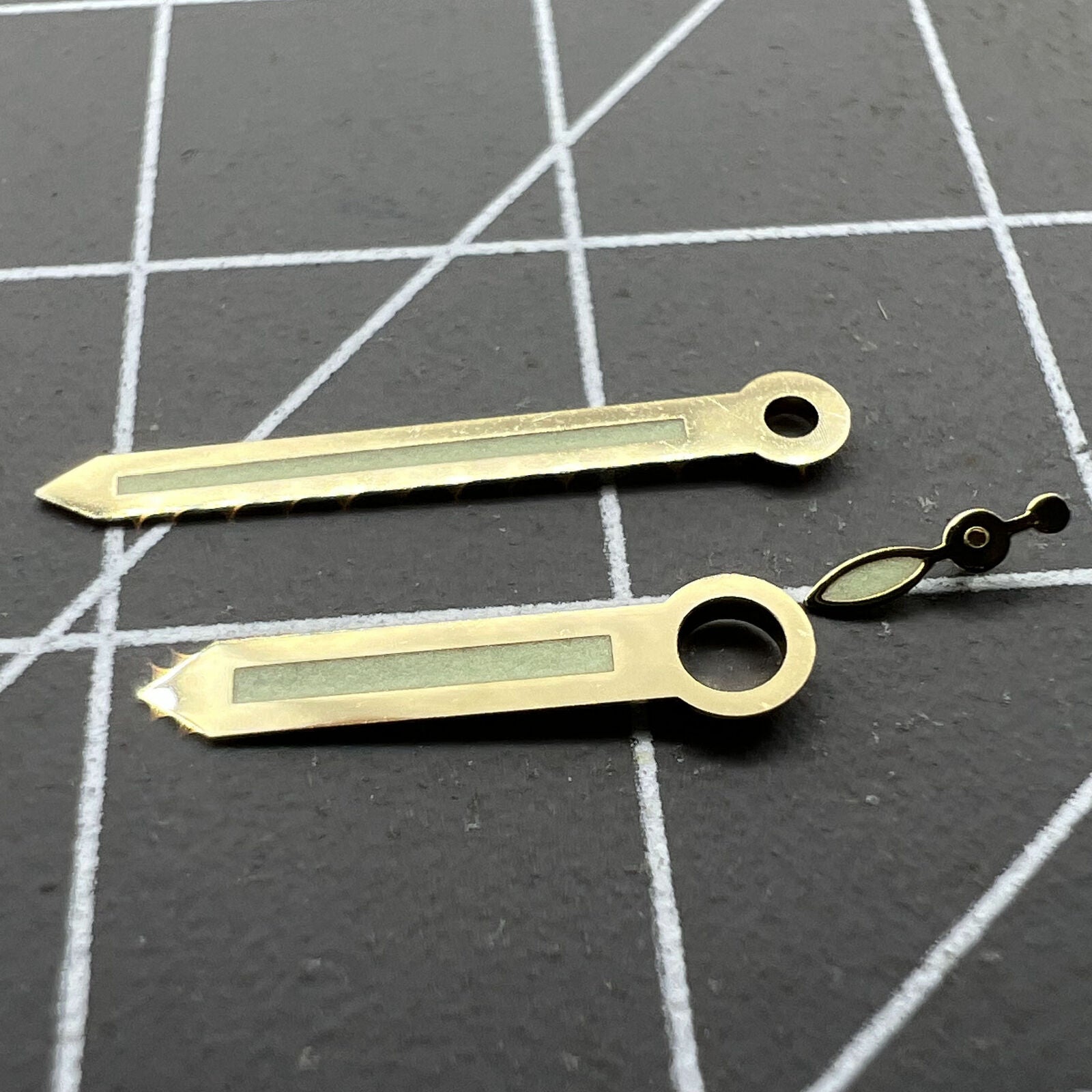 Golden trim green luminous watch hands for ST3600, enhancing readability and elegant style.